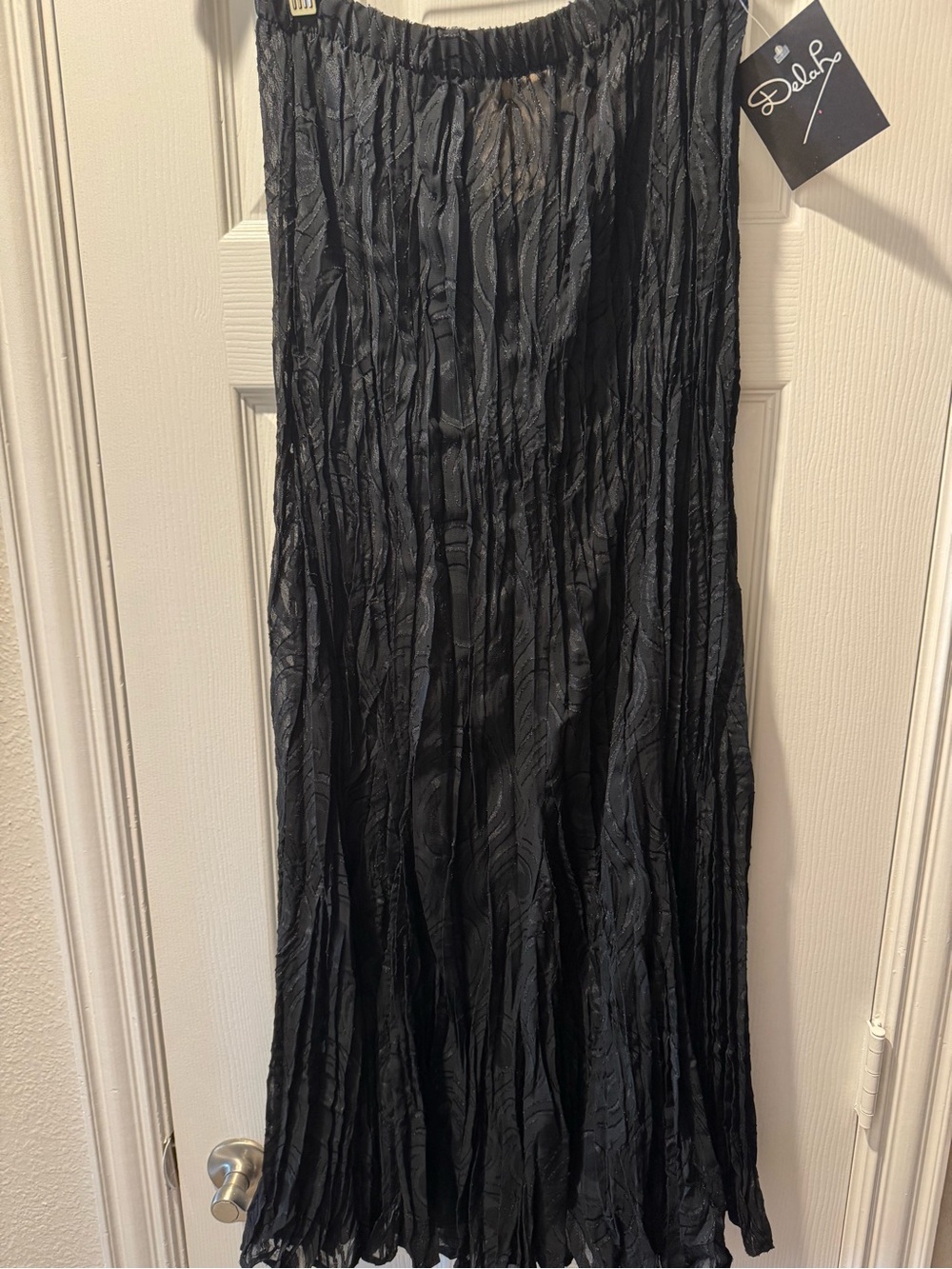 vintage black plissé crinkle maxi skirt designed by the brand Delah McKay.